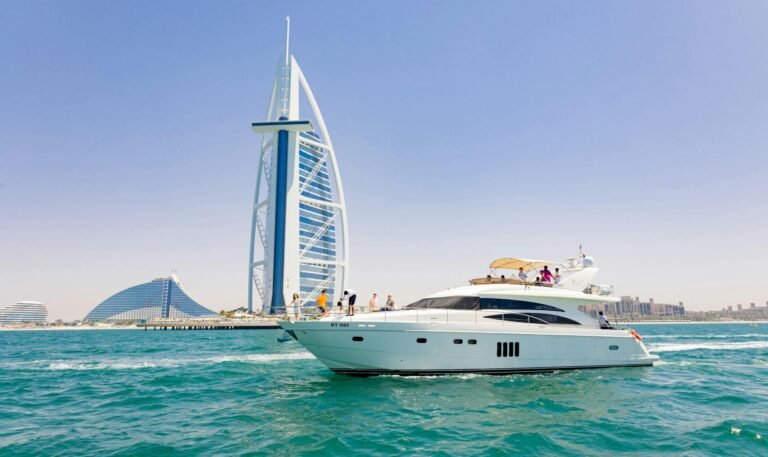 Luxury yacht charter Dubai Marina with Burj Al Arab in background